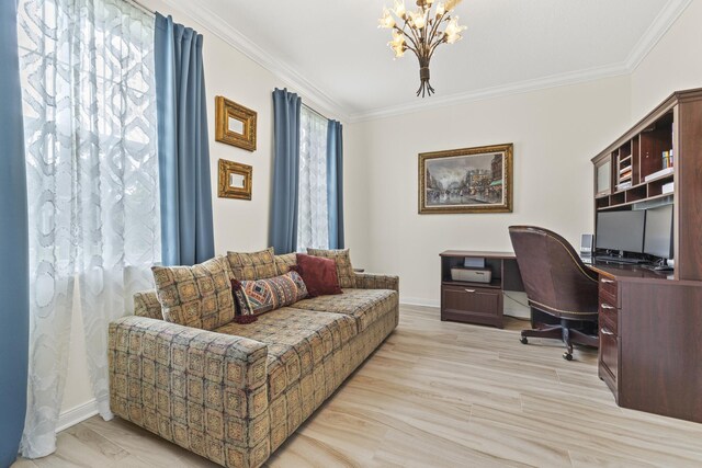 bedroom featuring crown molding, an inviting chandelier, light wood-style flooring, and baseboards