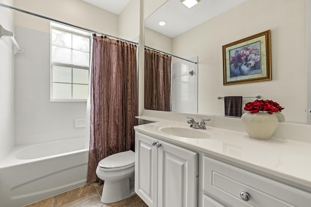 full bathroom with shower / bath combo, vanity, and toilet