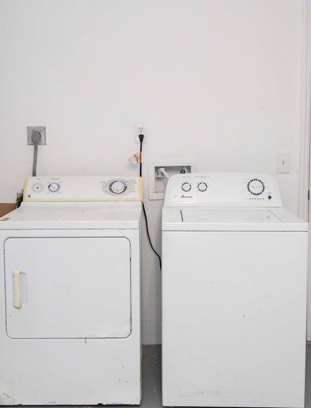 laundry area featuring laundry area and washer and dryer