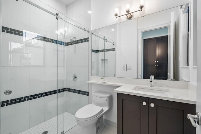 bathroom featuring vanity, toilet, and walk in shower