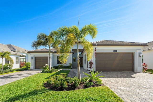 single story home featuring a garage