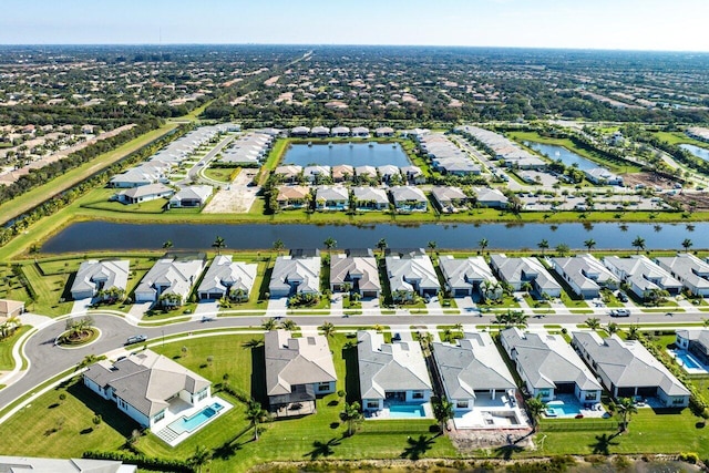 drone / aerial view with a water view