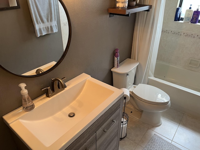 full bathroom featuring tile patterned flooring, vanity, toilet, and shower / bathtub combination with curtain