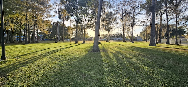 surrounding community featuring a lawn