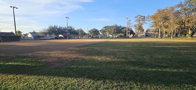 view of property's community with a yard