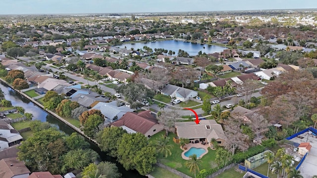 drone / aerial view featuring a water view