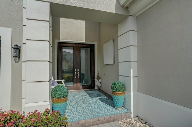 property entrance featuring french doors