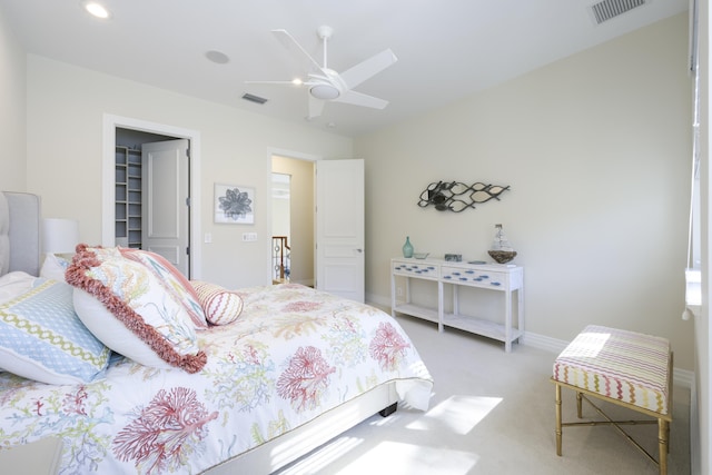 bedroom with ceiling fan and carpet flooring