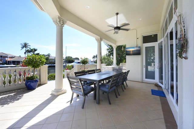 view of patio / terrace featuring ceiling fan