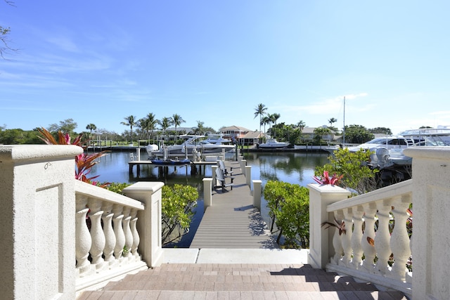 dock area featuring a water view