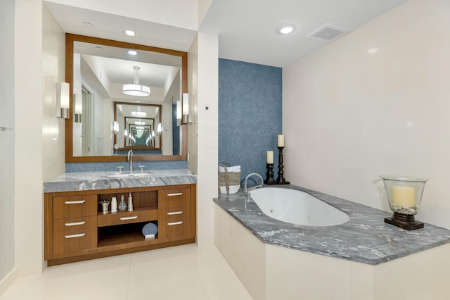 full bathroom featuring recessed lighting, visible vents, vanity, a jetted tub, and tile patterned floors