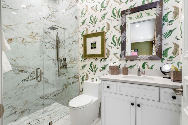 bathroom with walk in shower, vanity, and toilet