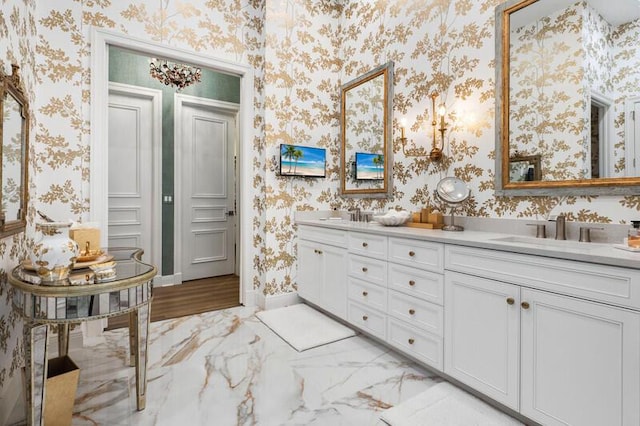 11205 Orange Hibiscus Ln, Palm Beach Gardens, FL 33418 - bathroom with wallpapered walls, double vanity, and marble finish flooring