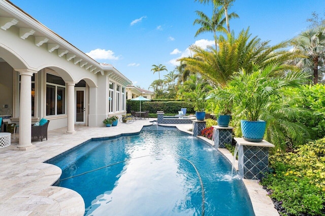 11205 Orange Hibiscus Ln, Palm Beach Gardens, FL 33418 - view of swimming pool with a patio area