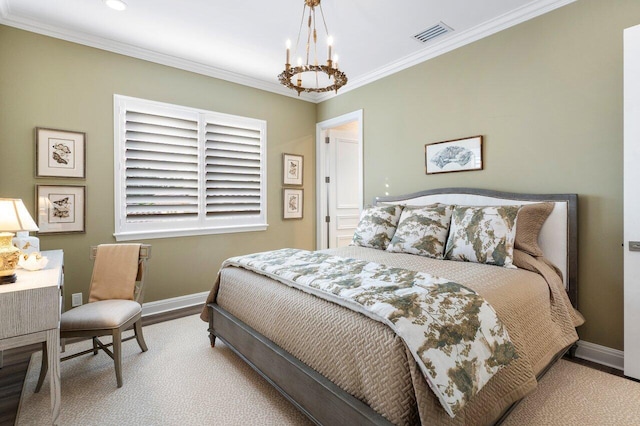 bedroom featuring a notable chandelier, ornamental molding, and light hardwood / wood-style floors