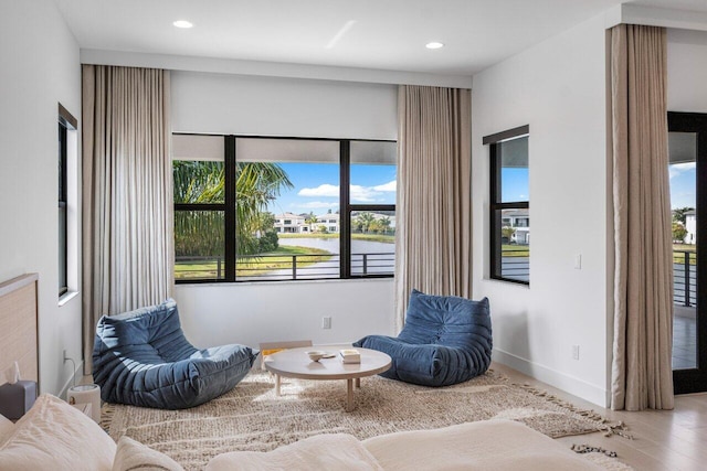 living area featuring hardwood / wood-style flooring