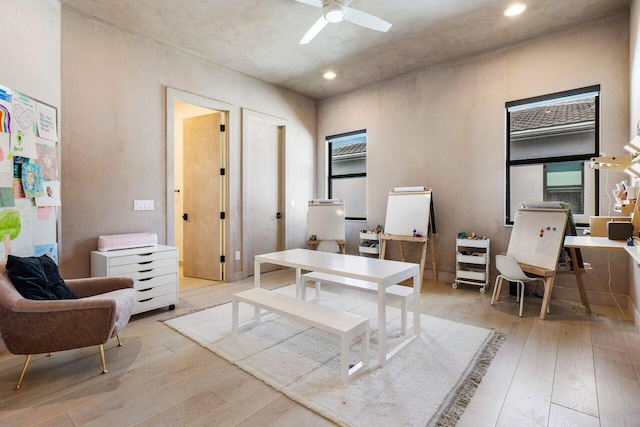 office area featuring ceiling fan and light wood-type flooring