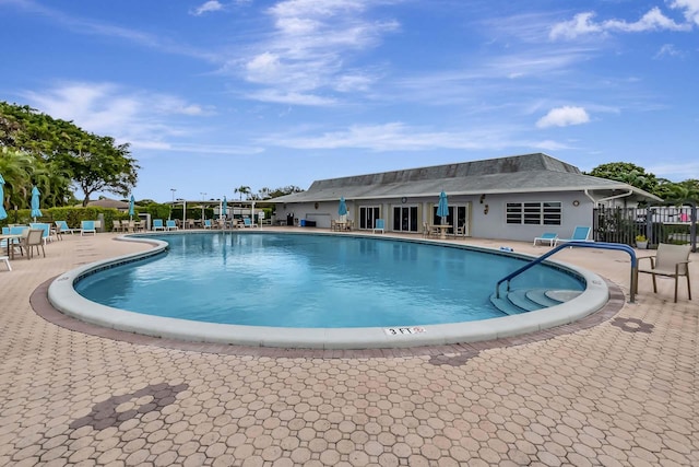 view of pool featuring a patio