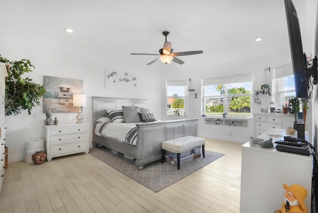 bedroom featuring ceiling fan and light wood-type flooring