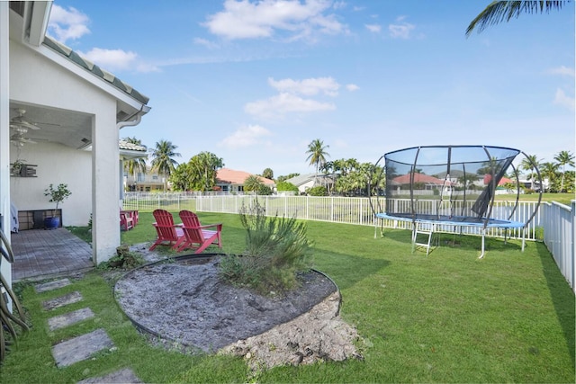 view of yard with a trampoline