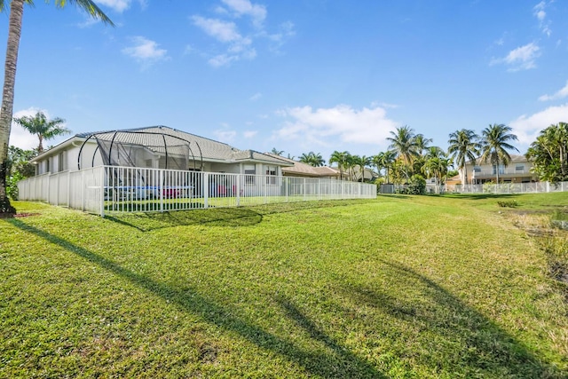 view of yard with a lanai