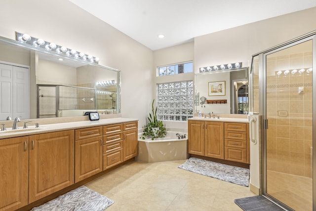 11380 SW Aspen Ln, Port Saint Lucie, FL 34987 - bathroom with independent shower and bath, vanity, and tile patterned floors
