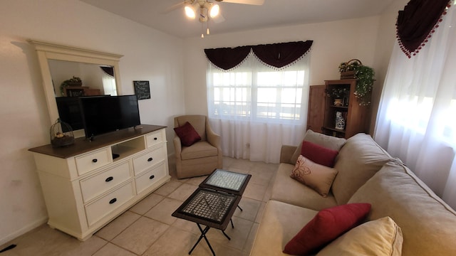 living room with light tile patterned floors and ceiling fan