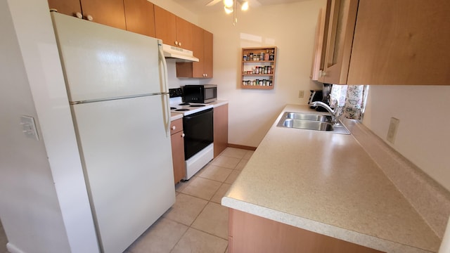 kitchen featuring sink, ceiling fan, electric range oven, light tile patterned flooring, and white fridge