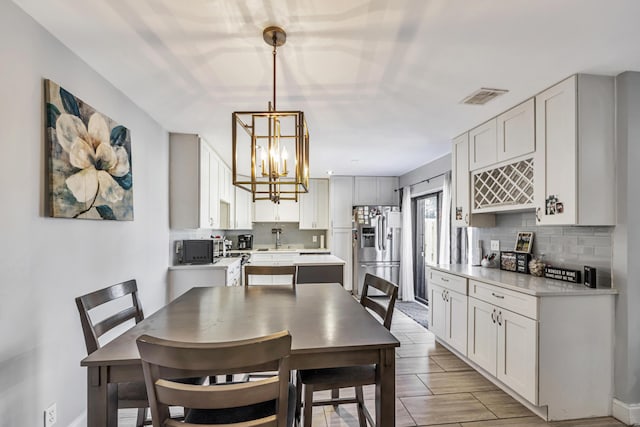 dining room with an inviting chandelier