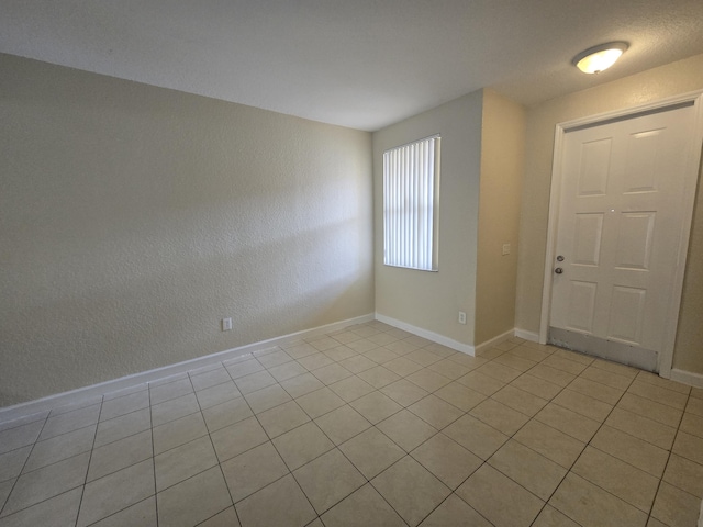 view of tiled foyer entrance