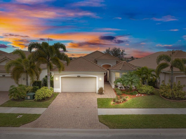 mediterranean / spanish-style house featuring a garage