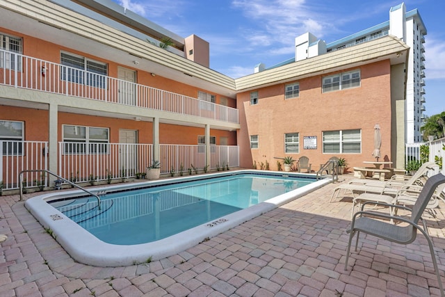 view of pool with a patio