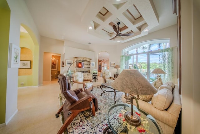 7551 Monticello Way, Boynton Beach, FL 33437 - living room with arched walkways, coffered ceiling, recessed lighting, ceiling fan, and beamed ceiling