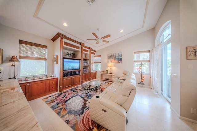 7551 Monticello Way, Boynton Beach, FL 33437 - living area featuring healthy amount of natural light, lofted ceiling, a ceiling fan, light tile patterned floors, and recessed lighting