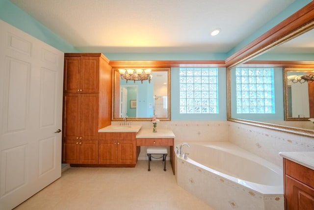 7551 Monticello Way, Boynton Beach, FL 33437 - full bathroom with vanity, a chandelier, and a garden tub
