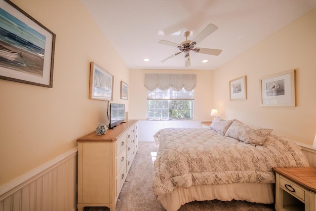 7551 Monticello Way, Boynton Beach, FL 33437 - carpeted bedroom with a wainscoted wall and a ceiling fan