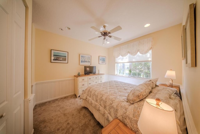 7551 Monticello Way, Boynton Beach, FL 33437 - carpeted bedroom featuring a wainscoted wall, ceiling fan, and recessed lighting