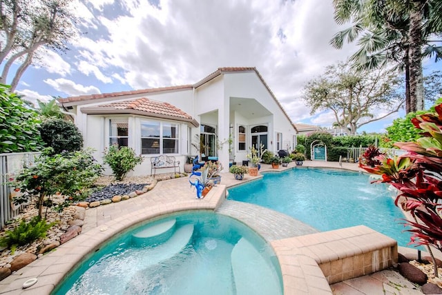 view of swimming pool featuring a patio