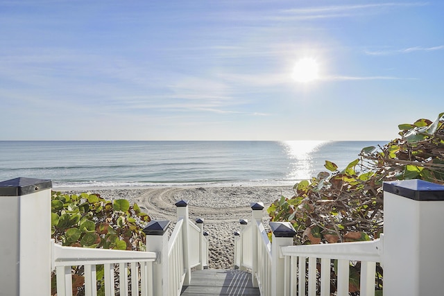 property view of water featuring a beach view