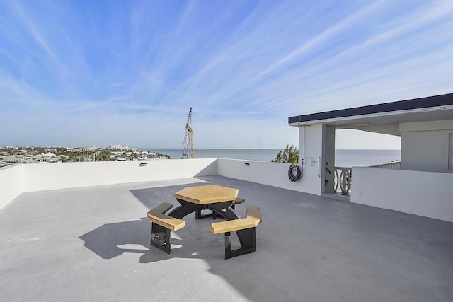 view of patio / terrace featuring a water view