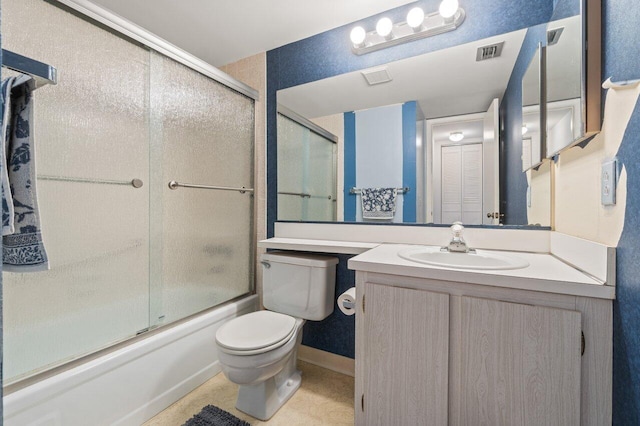 full bathroom with vanity, toilet, and combined bath / shower with glass door