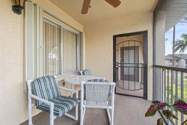 balcony featuring ceiling fan