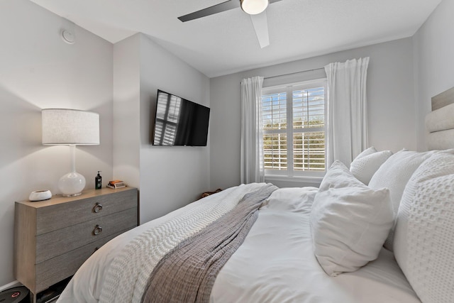 bedroom featuring ceiling fan