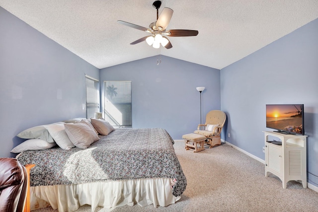 carpeted bedroom with ceiling fan, vaulted ceiling, and a textured ceiling