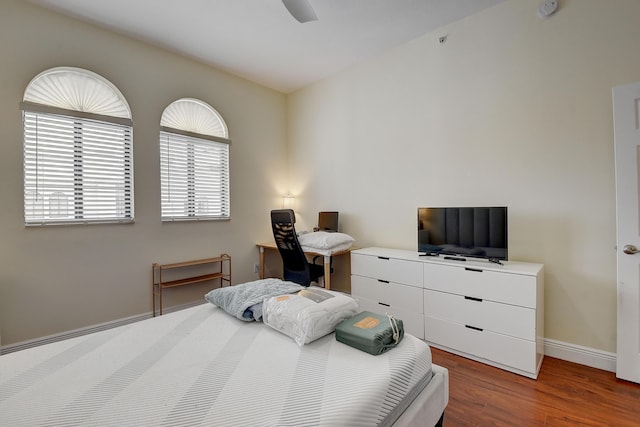 bedroom featuring ceiling fan and hardwood / wood-style floors