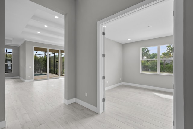 hall with light hardwood / wood-style flooring