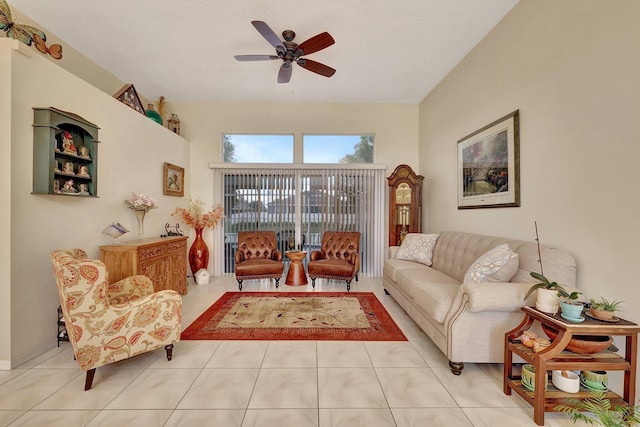 tiled living room with ceiling fan