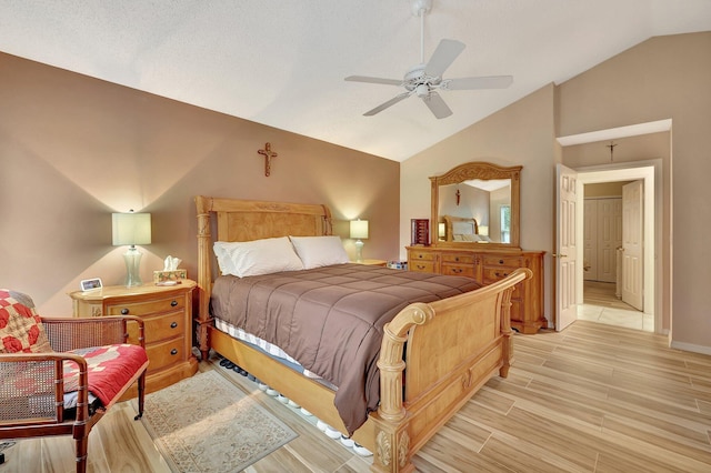 bedroom featuring ceiling fan and vaulted ceiling