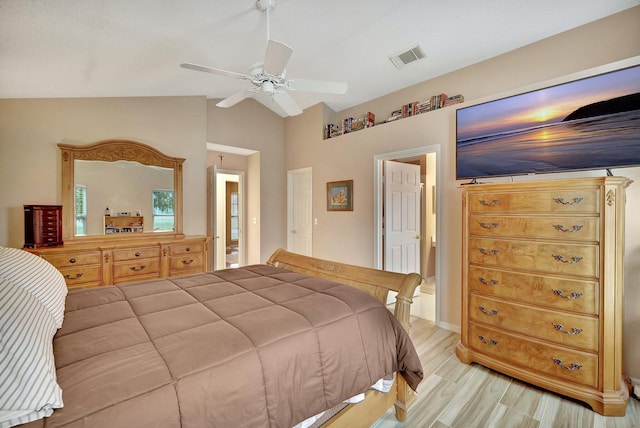 bedroom with lofted ceiling, ceiling fan, and light hardwood / wood-style floors