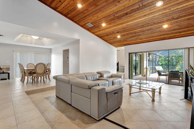 living room with light tile patterned flooring, visible vents, and wood ceiling